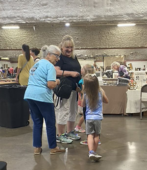 Kathy at the Antique Show
